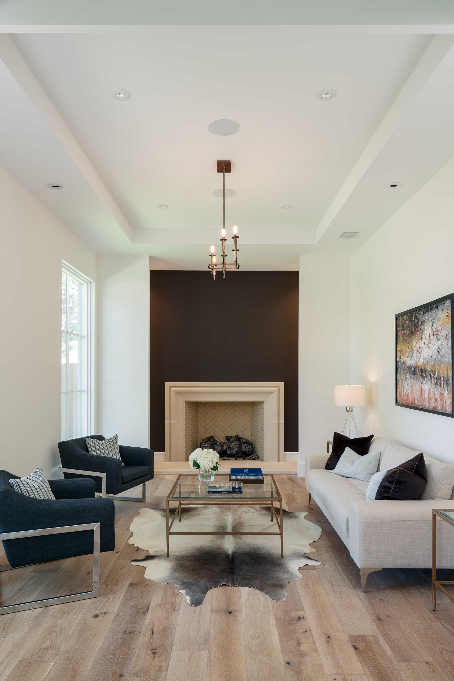 a living room with a fireplace and a couch