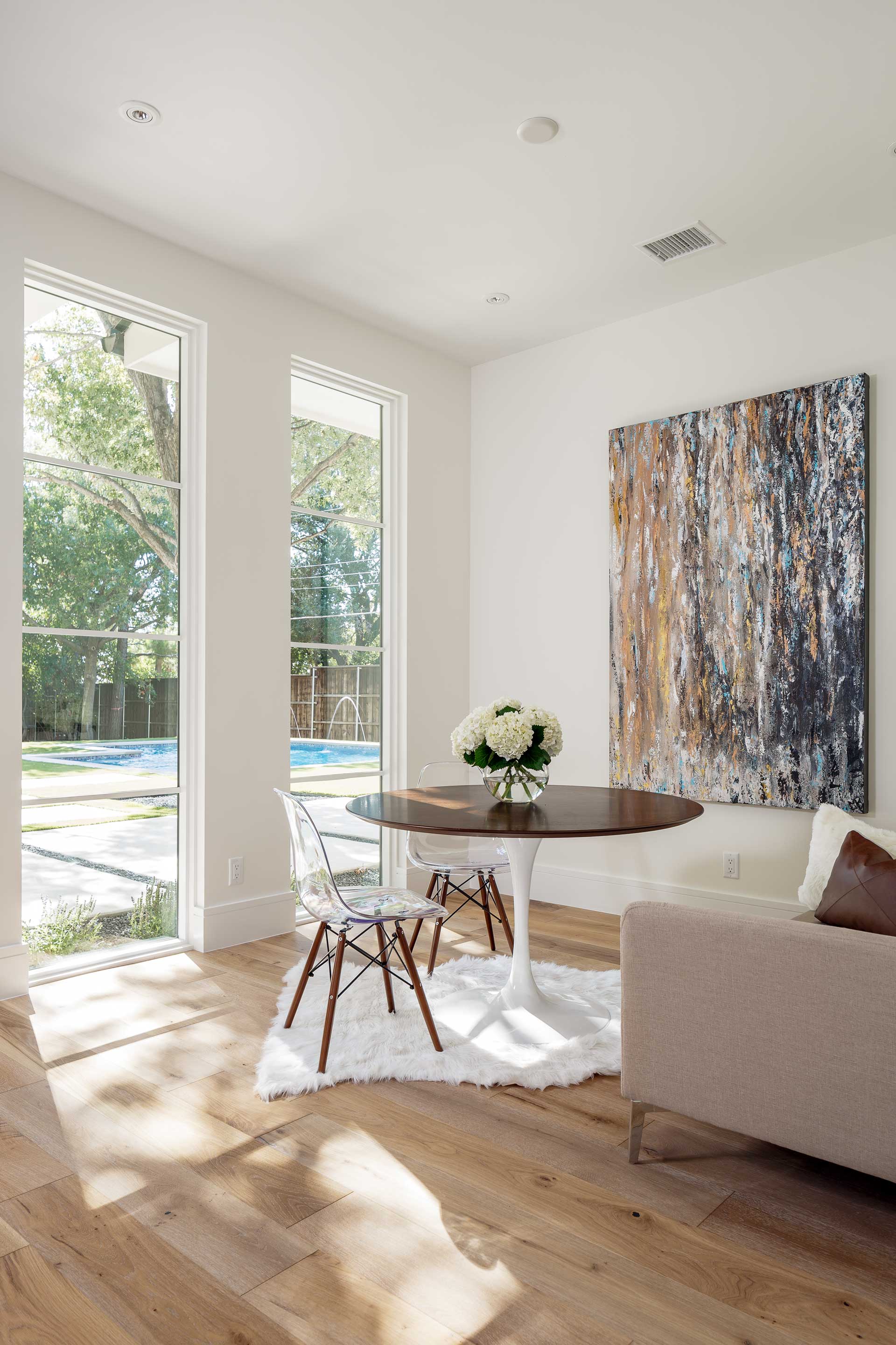 a room with a table and chairs