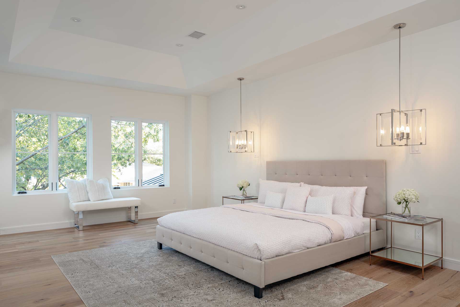 a bedroom with a bed and a couch