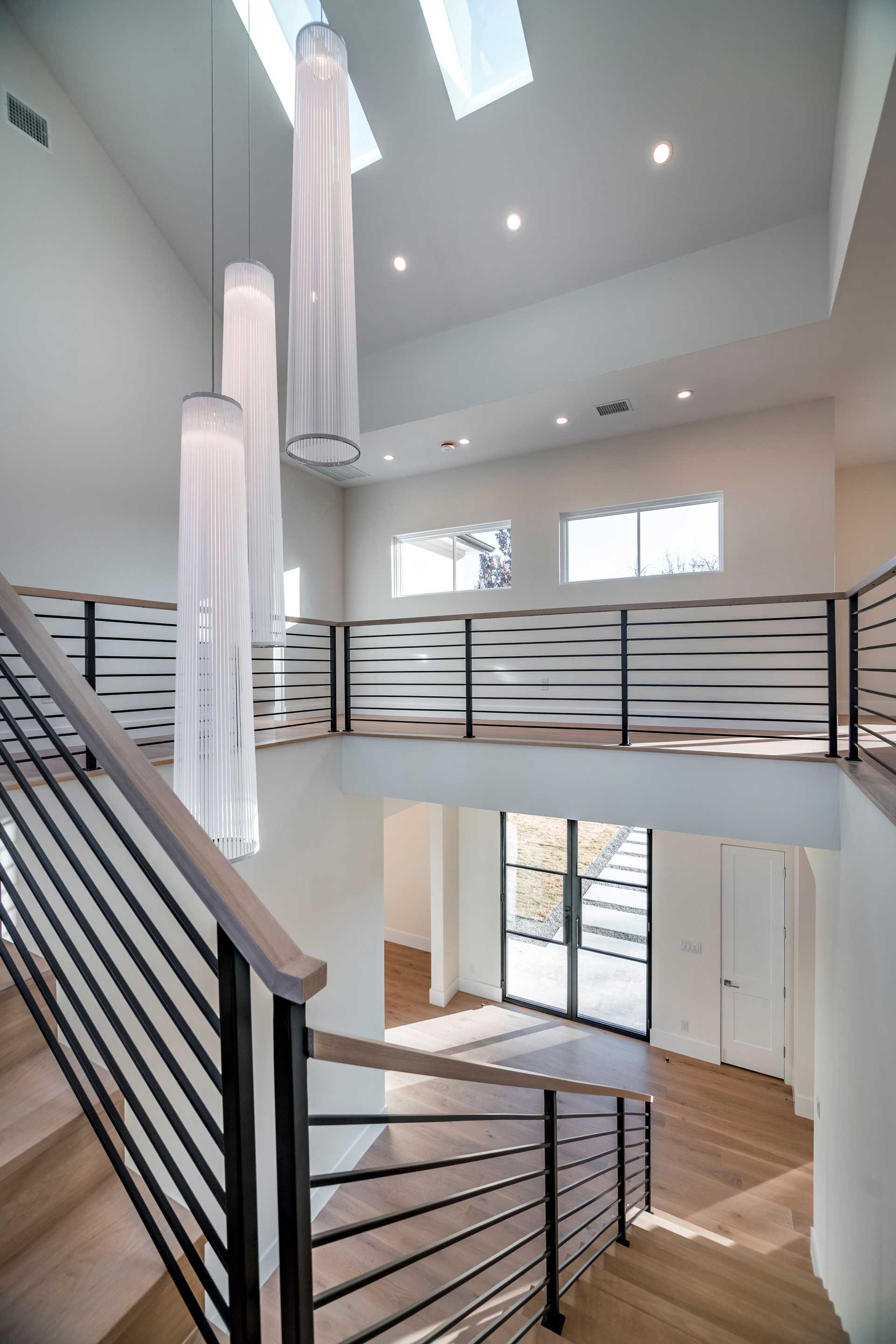 a staircase with metal railings