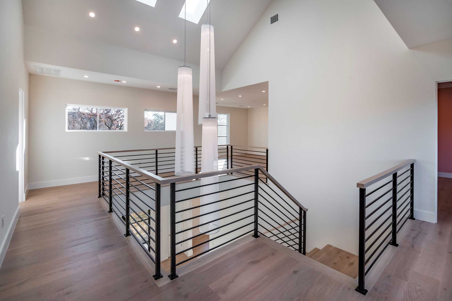 a staircase with metal railings