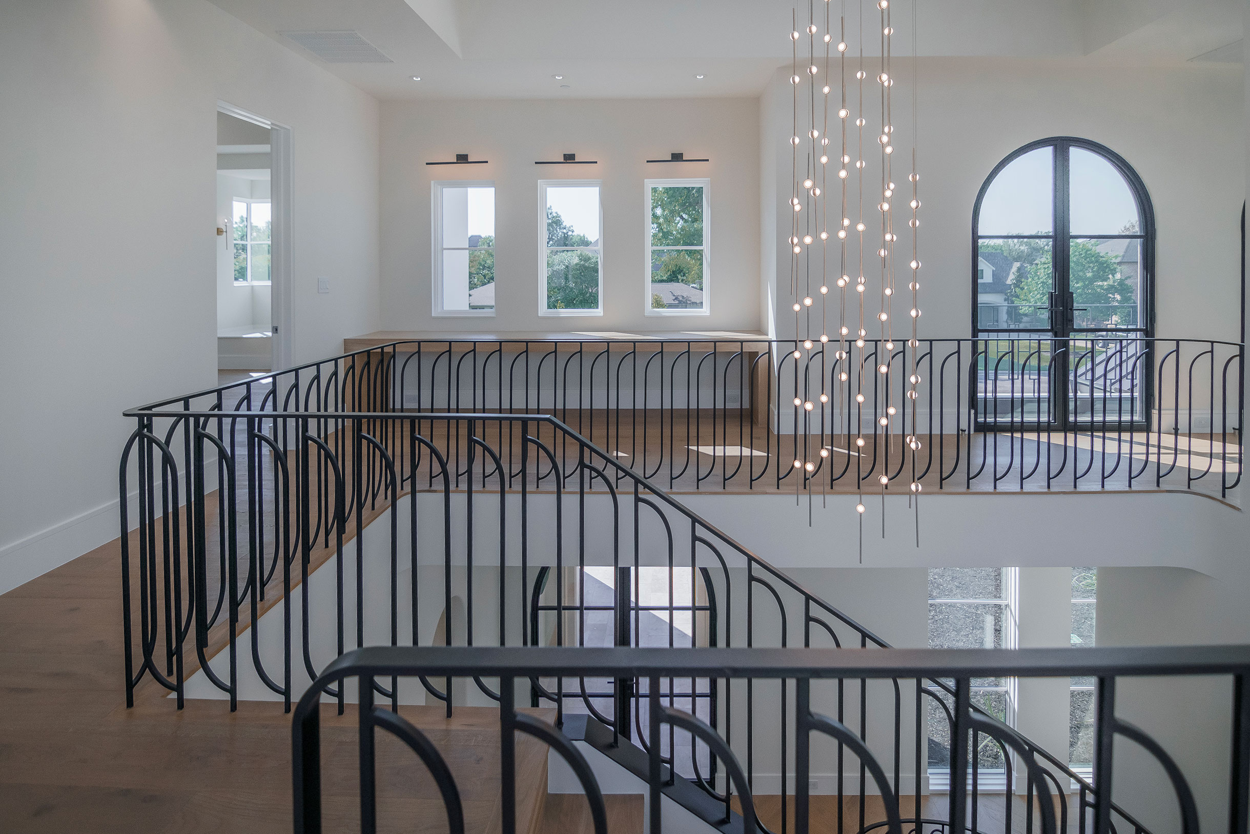 a spiral staircase with metal railing