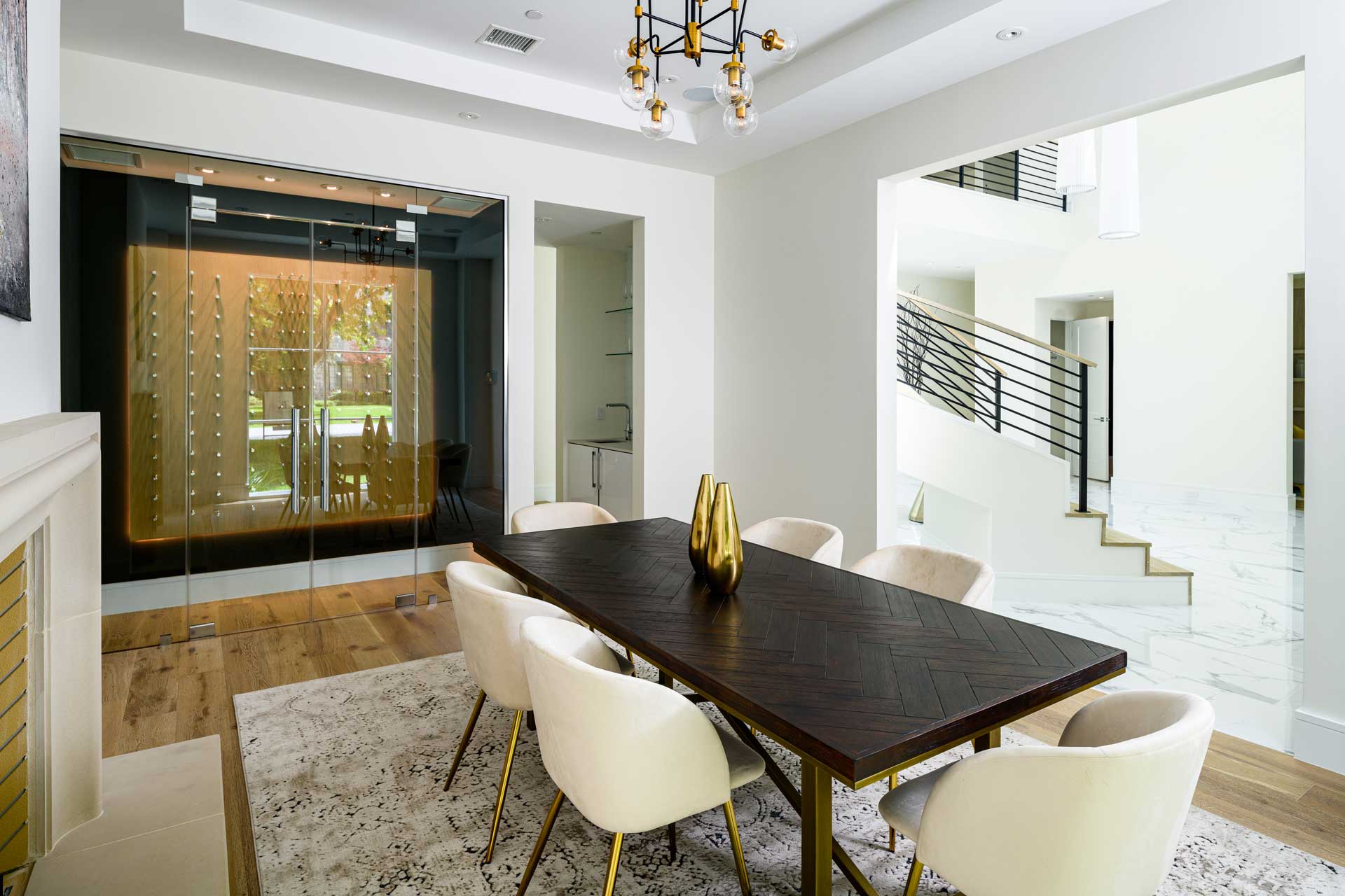 a dining room with a table and chairs